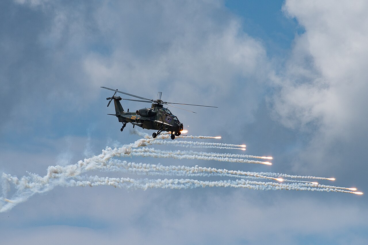 Z-10K helicopter releasing flares at a 2023 air show