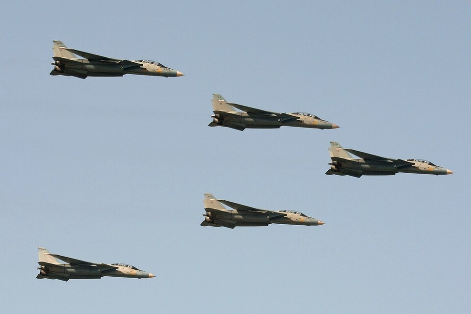 Five Iranian Air Force F-14A aircraft in flight
