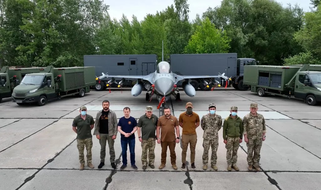 Ukrainian F-16 with its maintenance equipment and crew